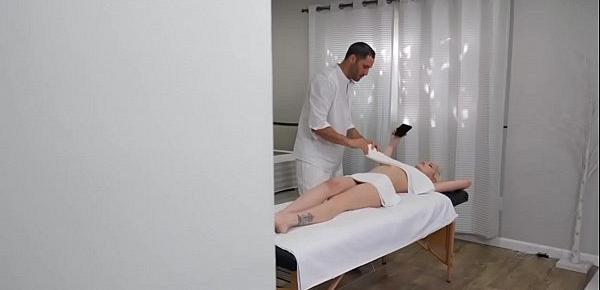  Oiled blonde gets fucked by masseur